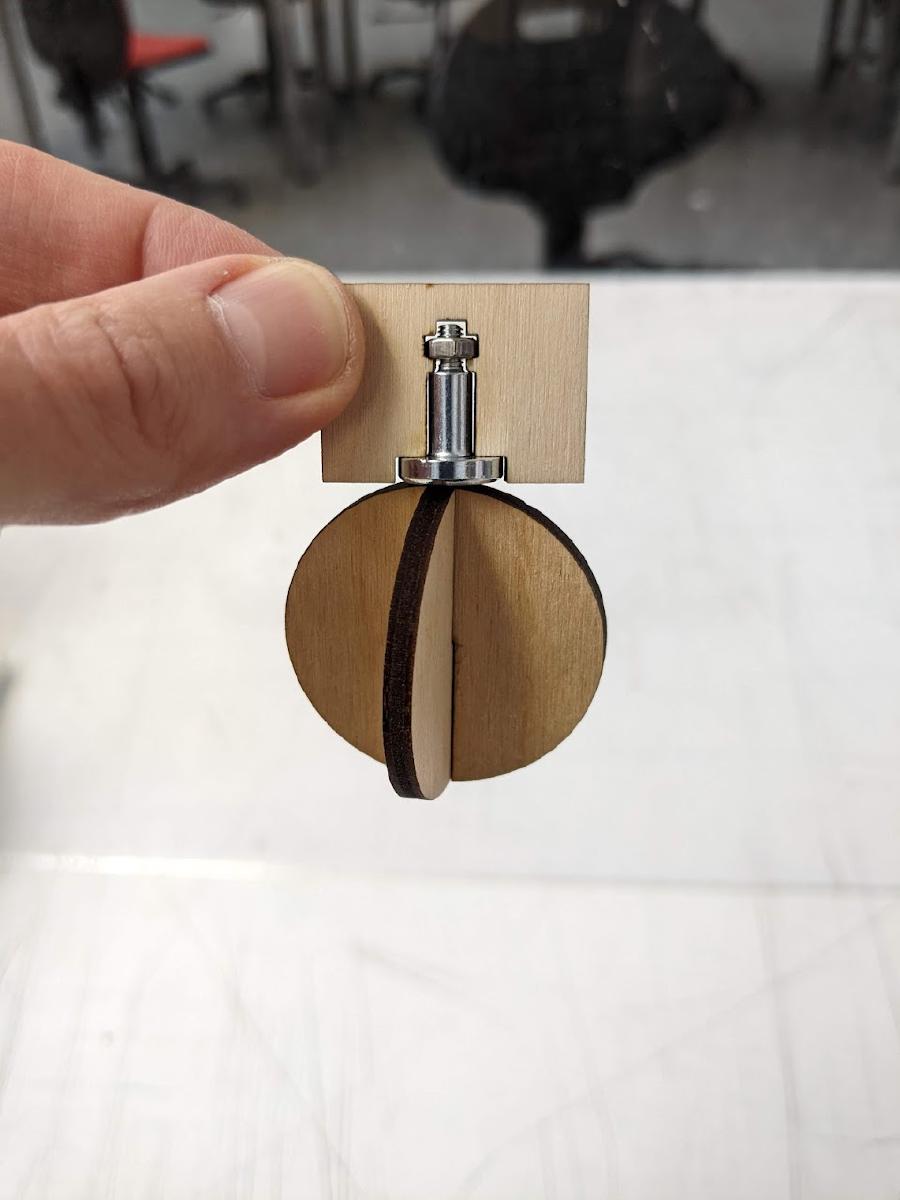 Apple hung on magnet